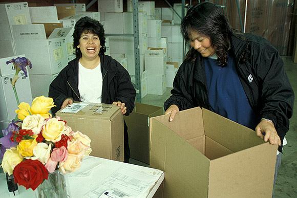 Teresa and Josefina, packing wine, in the late 1990s