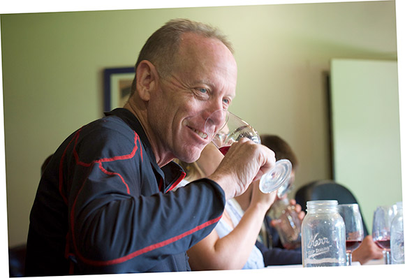 Jim Klein, Navarro's Winemaker, evaluating a red wine during a morning tasting panel.