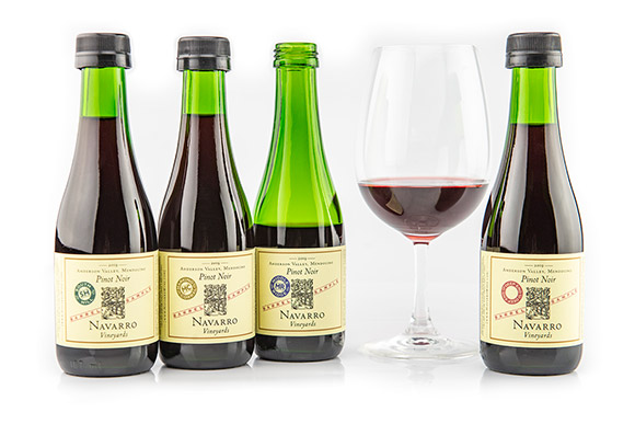Four 187 ml. bottles of Pinot Noir barrel samplers.