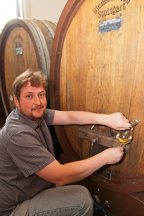 Aaron drawing a wine sample from one of our smaller ovals.